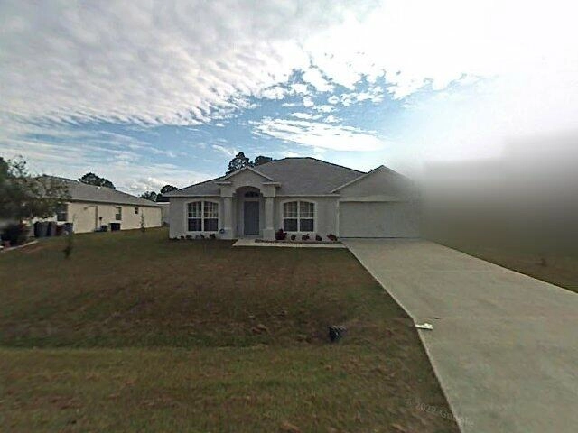 House image located at Palm Bay, FL 32909