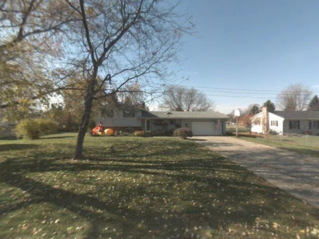 House image located at Perry, MI 48872