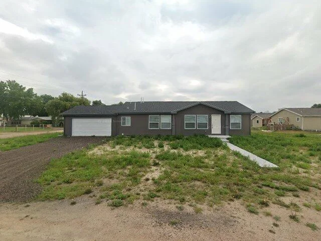 House image located at Log Lane Village, CO 80705