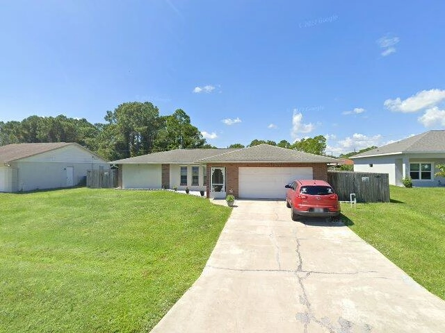 House image located at Palm Bay, FL 32909