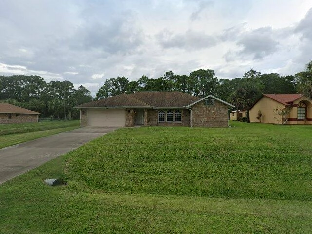 House image located at Palm Bay, FL 32909