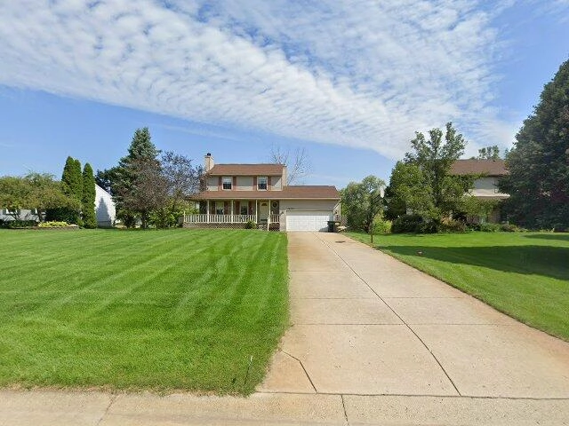 House image located at New Hudson, MI 48165