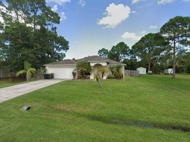 House image located at Palm Bay, FL 32908