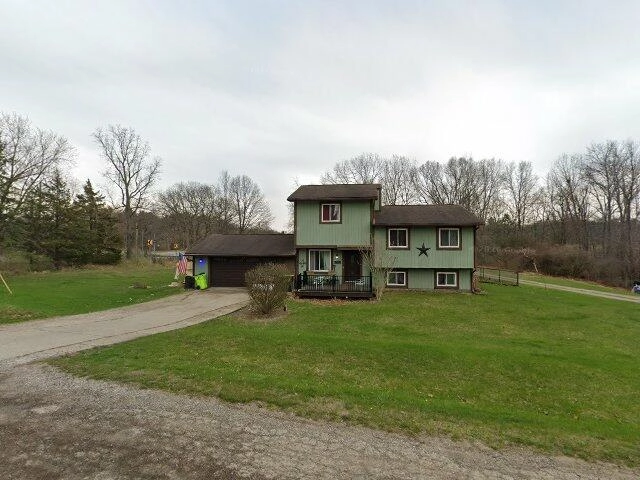 House image located at Highland, MI 48357