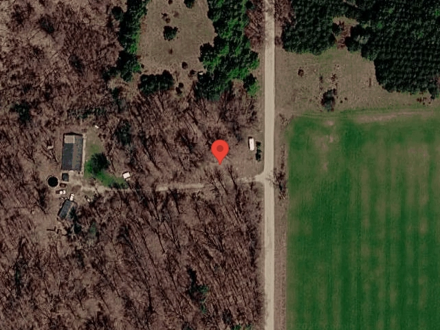 House image located at Sumner, MI 48889