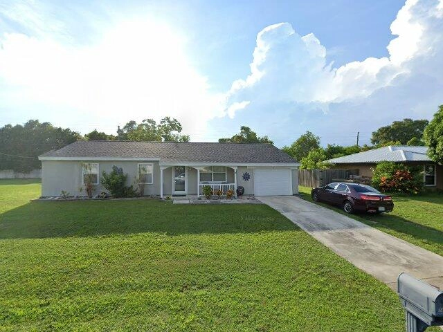 House image located at Palm Bay, FL 32905