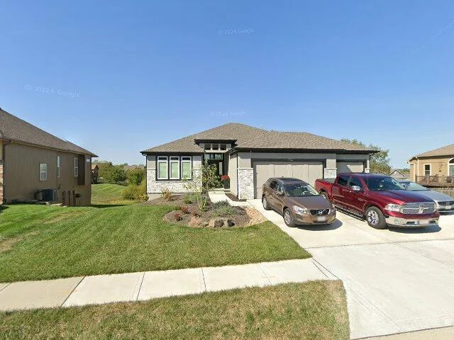 House image located at Raymore, MO 64083