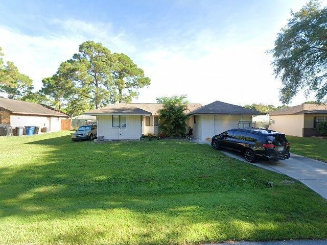 House image located at Palm Bay, FL 32907