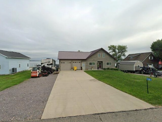 House image located at Six Lakes, MI 48886